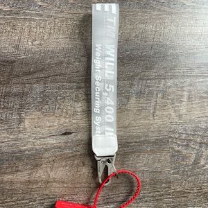 OFF-WHITE wrist keychain with red zip tie.